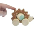 Wooden push along hedgehog toy eco friendly design