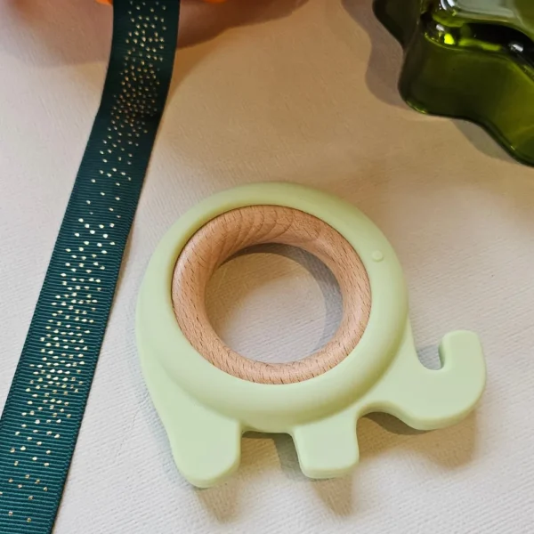 mint-green-elephant-silicone-wooden-teether-toy