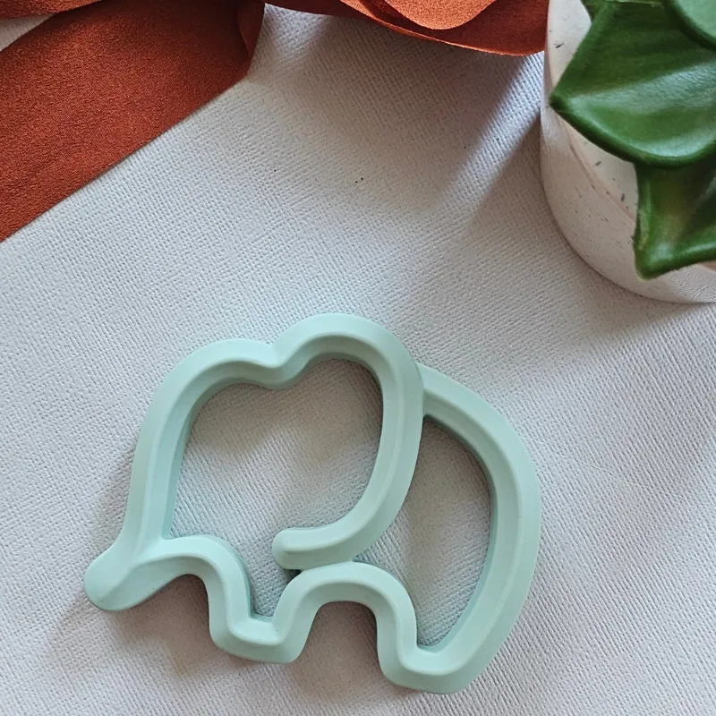 Silicone Elephant Baby Teether Mint green elephant-shaped silicone baby teether for infant gum relief